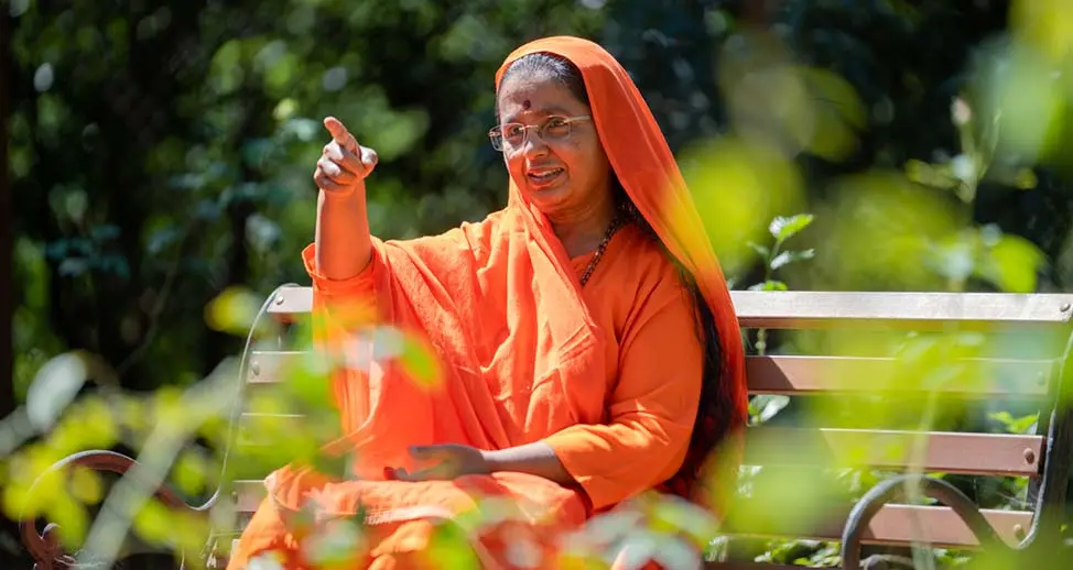 Ammaji, promoting Purna Vidya's message of service